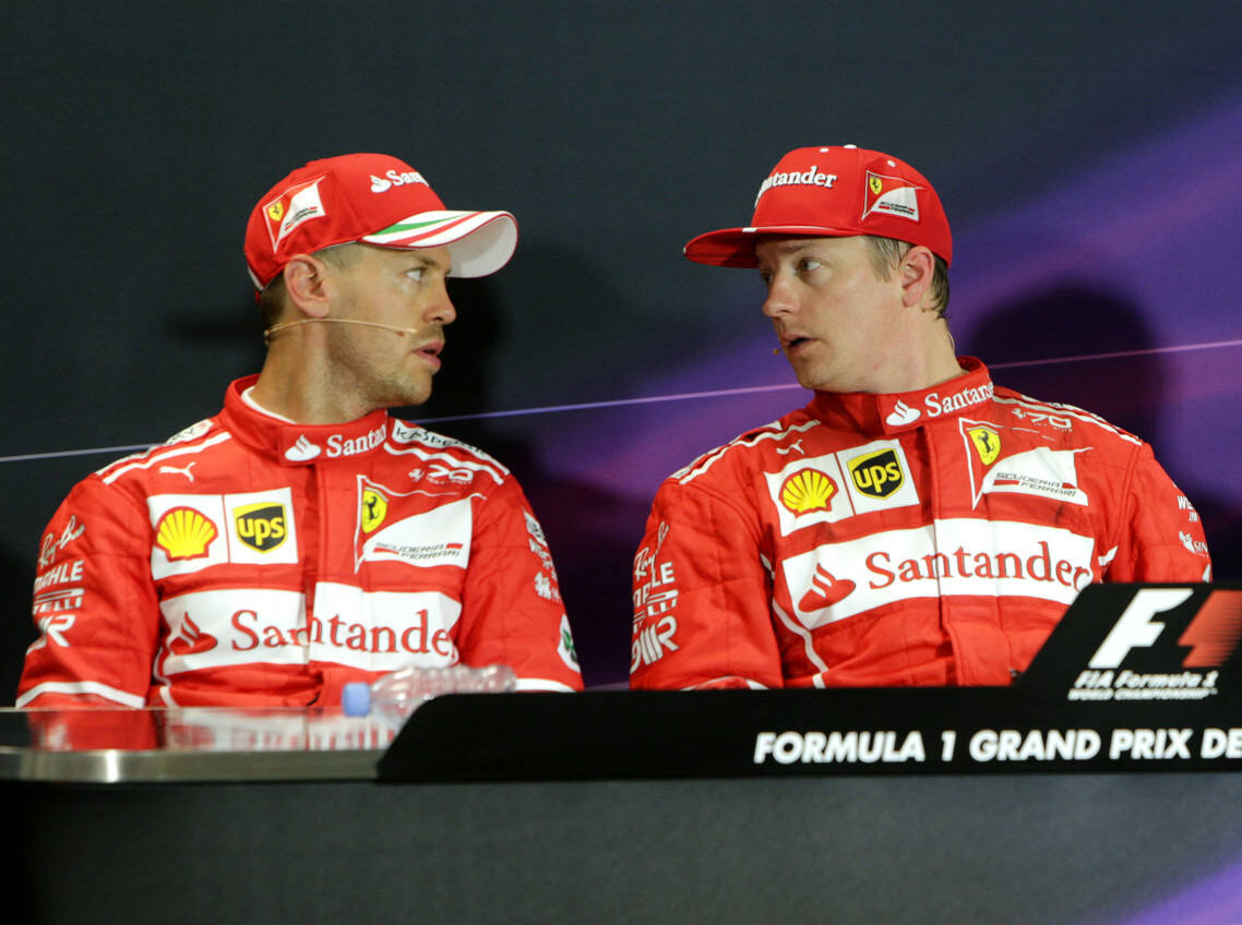 Foto zur News: Rote erste Reihe: Räikkönen beschwingt, Vettel angefressen