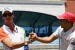 Foto zur News: Adrian Sutil (Force India) und Lewis Hamilton (McLaren)