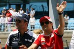 Foto zur News: Rubens Barrichello (Williams) und Felipe Massa (Ferrari)