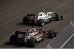 Foto zur News: Nico Rosberg (Mercedes) und Christian Klien (HRT)