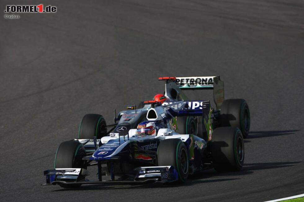 Foto zur News: Rubens Barrichello (Williams) und Michael Schumacher (Mercedes)