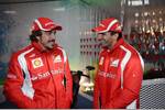 Foto zur News: Fernando Alonso und Marc Gene (Ferrari)
