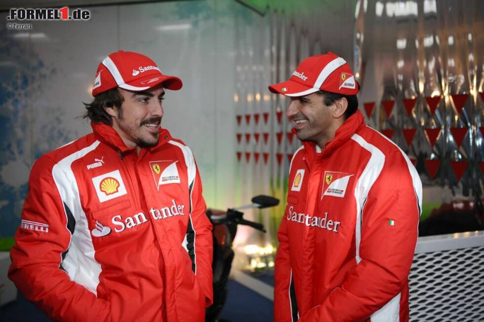 Foto zur News: Fernando Alonso und Marc Gene (Ferrari)