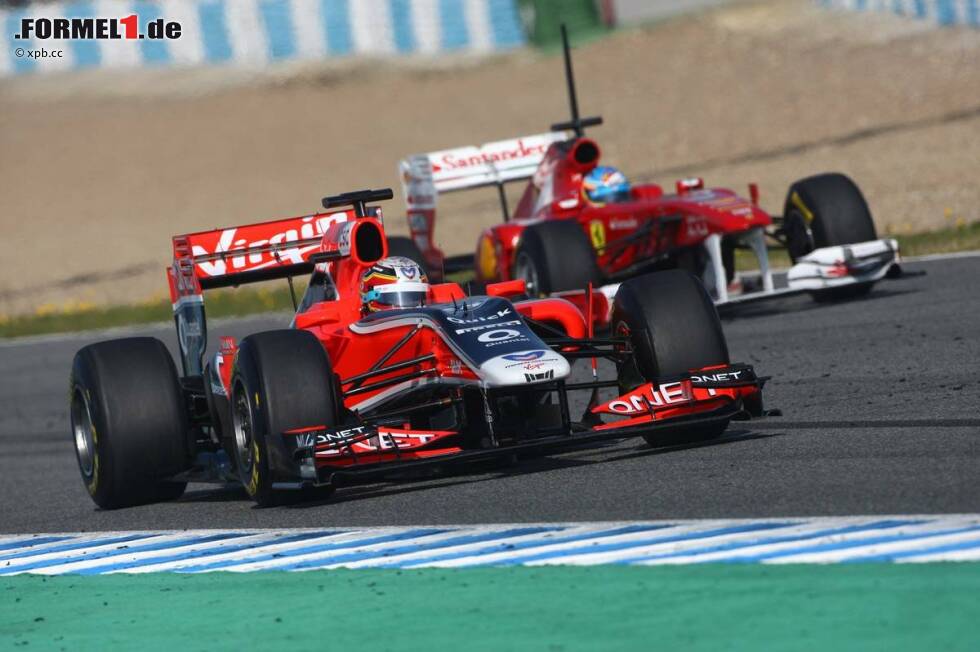 Foto zur News: Jerome D&#039;Ambrosio (Marussia-Virgin) Fernando Alonso (Ferrari)