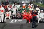 Foto zur News: Sebastian Vettel (Red Bull) und der Rest der Fahrer 2011