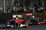 Foto zur News: Felipe Massa (Ferrari) und Jenson Button (McLaren)