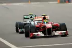 Foto zur News: Felipe Massa (Ferrari) und Nico Rosberg (Mercedes)