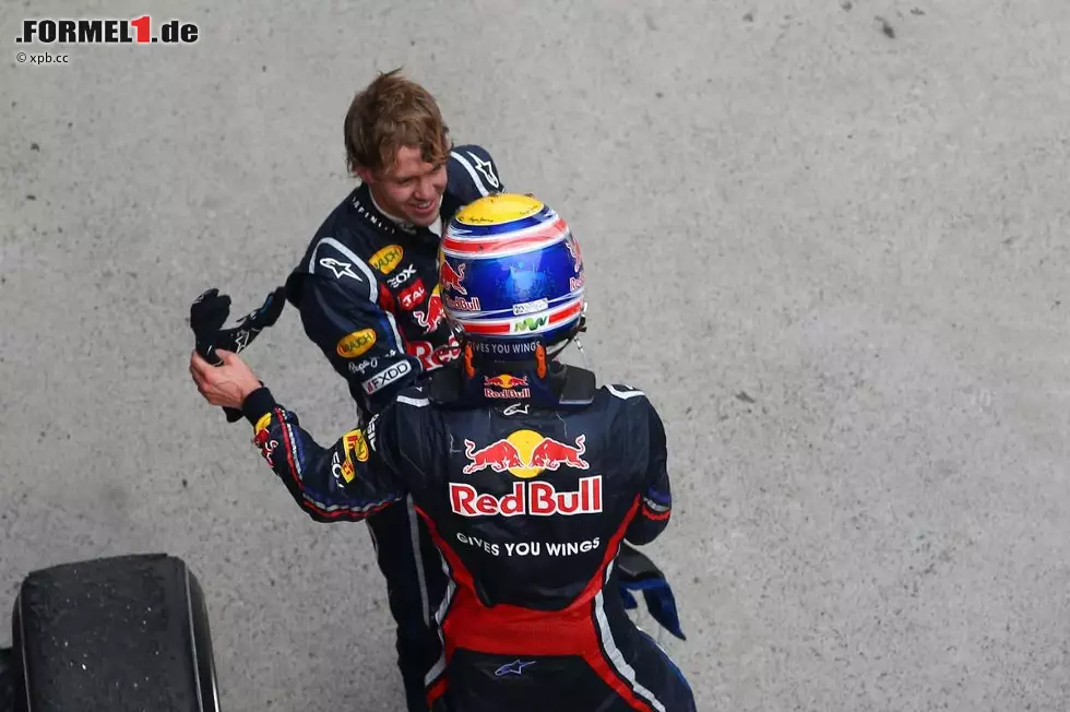 Foto zur News: Sebastian Vettel (Red Bull) und Mark Webber (Red Bull)