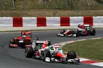 Foto zur News: Vitantonio Liuzzi (HRT) und Timo Glock (Marussia-Virgin)