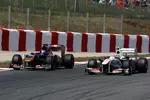 Foto zur News: Sebastien Buemi (Toro Rosso) und Sergio Perez (Sauber)