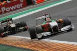 Foto zur News: Adrian Sutil (Force India) vor Witali Petrow (Renault)