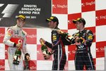 Foto zur News: Jenson Button (McLaren), Sebastian Vettel (Red Bull) und Mark Webber (Red Bull)