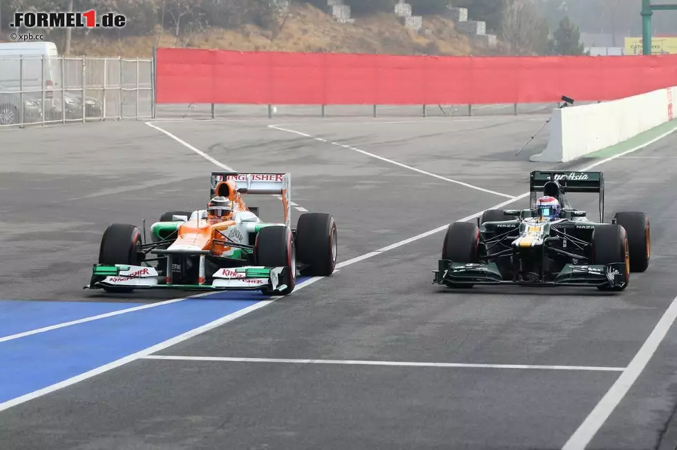 Foto zur News: Nico H?lkenberg (Force India) Witali Petrow (Caterham)