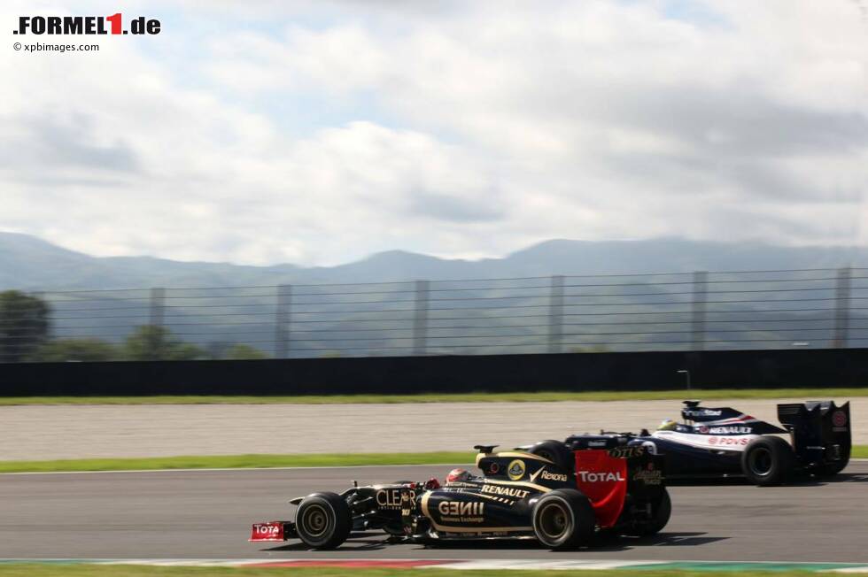 Foto zur News: Romain Grosjean (Lotus) Bruno Senna (Williams)