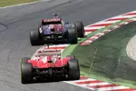 Foto zur News: Jean-Eric Vergne (Toro Rosso) und Felipe Massa (Ferrari) - der Brasiliener hatte im Rennen wieder einmal keine Chance.