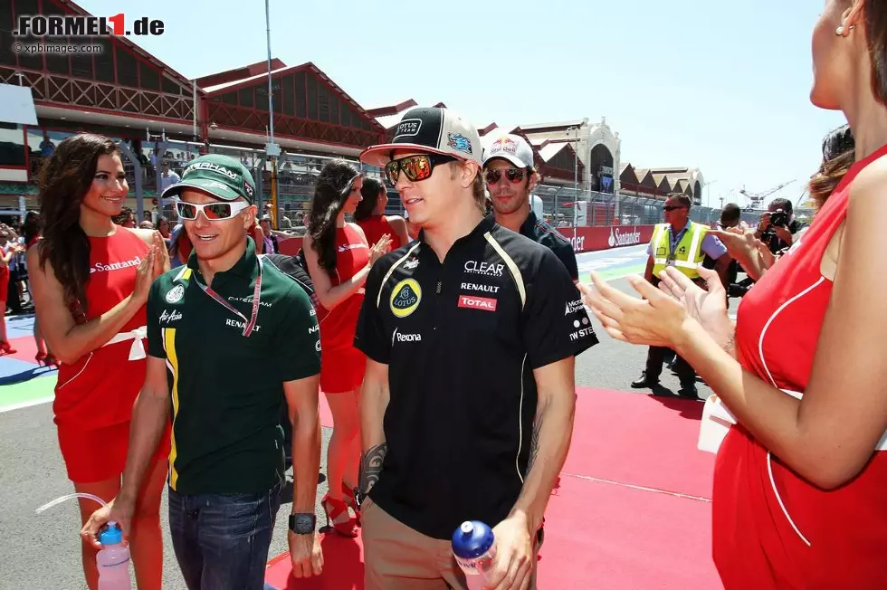 Foto zur News: Heikki Kovalainen (Caterham) und Kimi Räikkönen (Lotus)