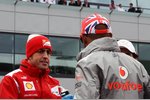 Foto zur News: Fernando Alonso (Ferrari) und Lewis Hamilton (McLaren)