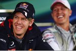 Foto zur News: Sebastian Vettel (Red Bull) und Michael Schumacher (Mercedes)