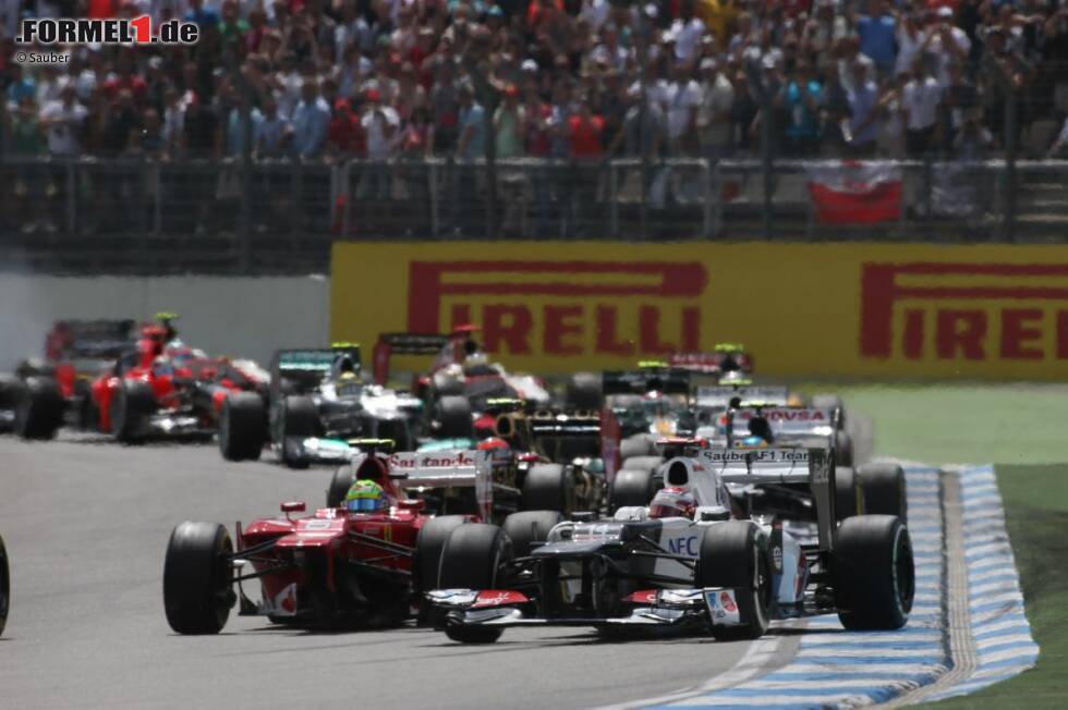 Foto zur News: Felipe Massa (Ferrari) und Kamui Kobayashi (Sauber)