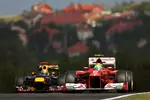 Foto zur News: Felipe Massa (Ferrari) und Sebastian Vettel (Red Bull)