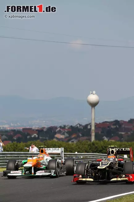 Foto zur News: Jules Bianchi (Force India) und Romain Grosjean (Lotus)
