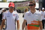 Foto zur News: Jenson Button (McLaren) und Paul di Resta (Force India)