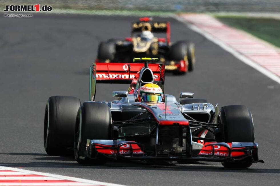 Foto zur News: Lewis Hamilton (McLaren) und Kimi Räikkönen (Lotus)