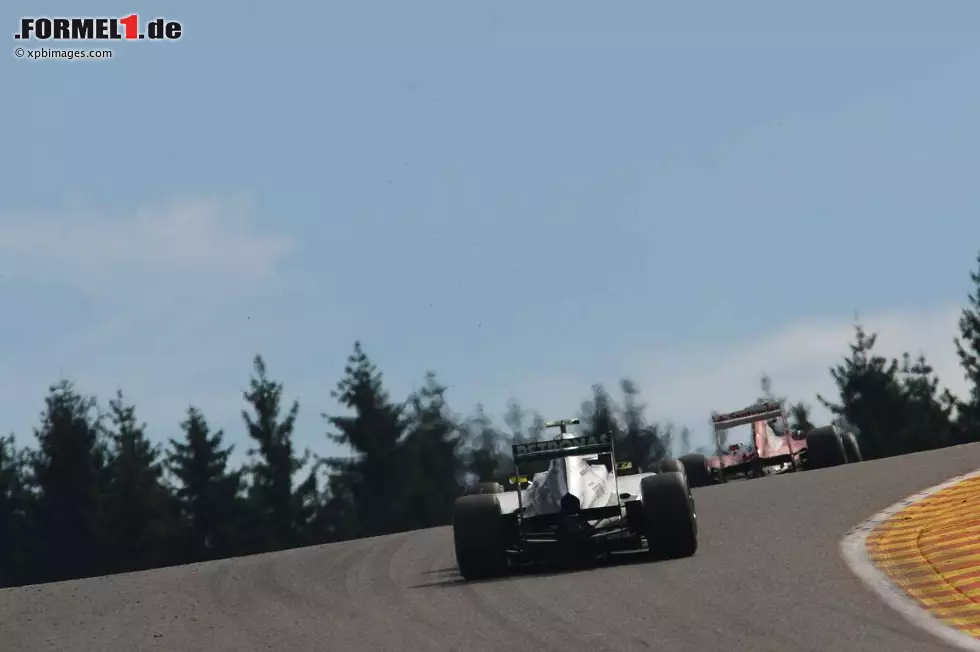 Foto zur News: Nico Rosberg (Mercedes) und Felipe Massa (Ferrari)