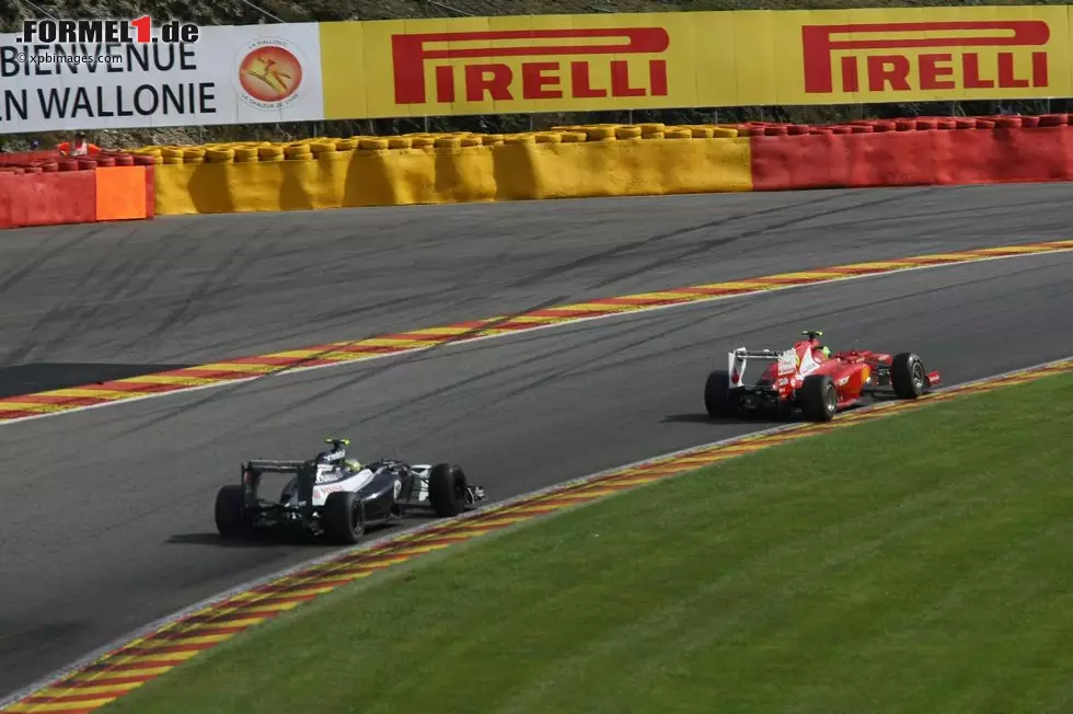 Foto zur News: Felipe Massa (Ferrari) und Bruno Senna (Williams)