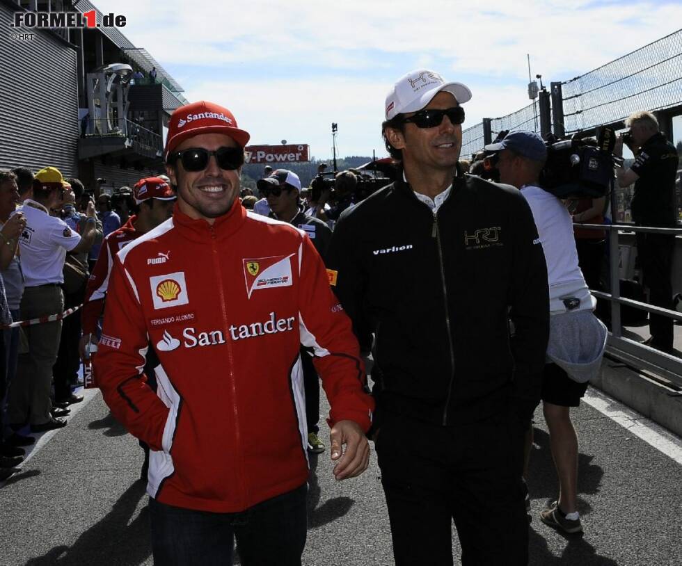 Foto zur News: Fernando Alonso (Ferrari) und Pedro de la Rosa (HRT)