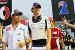 Foto zur News: Kamui Kobayashi (Sauber) und Bruno Senna (Williams)