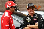 Foto zur News: Fernando Alonso (Ferrari) und Kimi Räikkönen (Lotus)