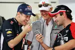 Foto zur News: Sebastian Vettel (Red Bull), Michael Schumacher (Mercedes) und Timo Glock (Marussia)