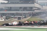 Foto zur News: Jean-Eric Vergne (Toro Rosso) mit defektem Frontflügel schon in der ersten Kurve