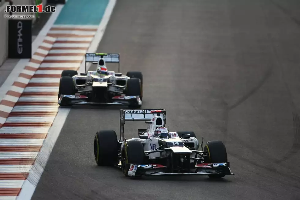 Foto zur News: Kamui Kobayashi (Sauber) und Sergio Perez (Sauber)