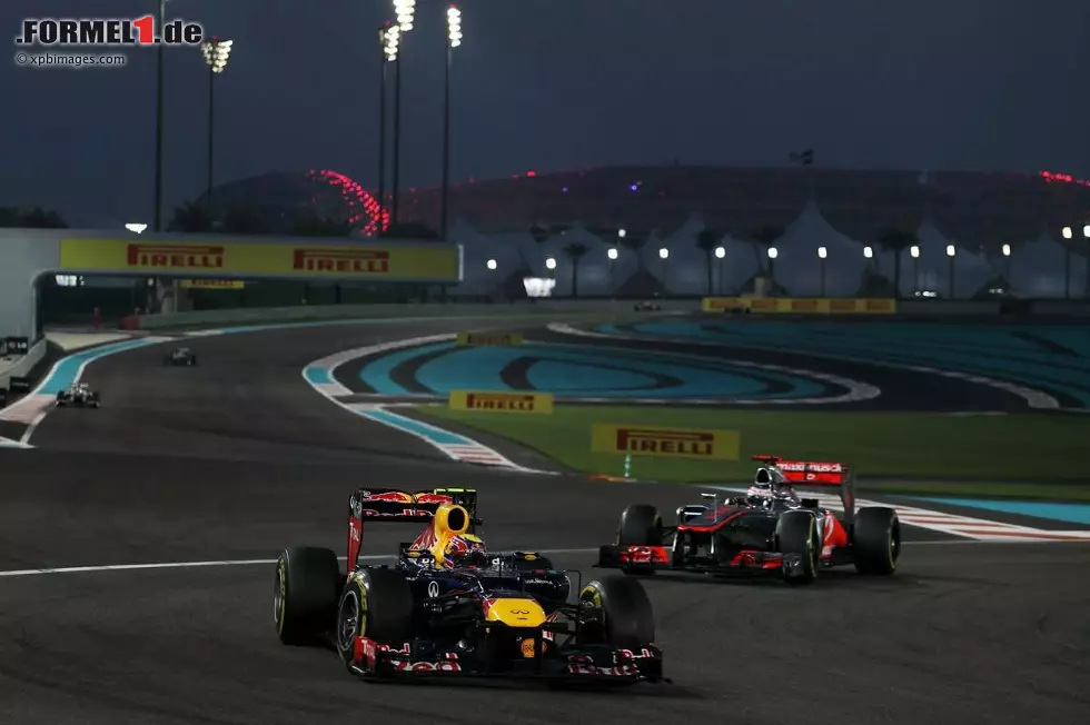 Foto zur News: Mark Webber (Red Bull) und Jenson Button (McLaren)