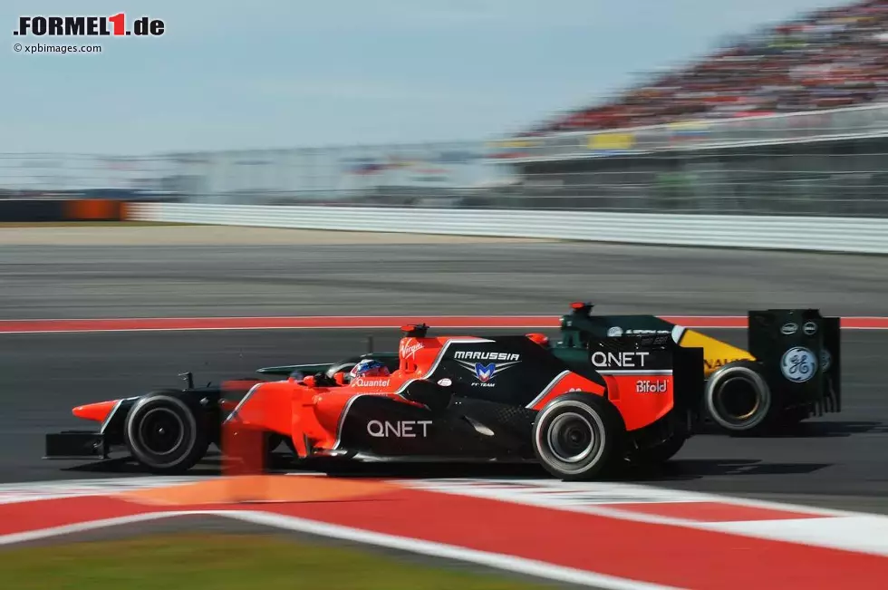Foto zur News: Timo Glock (Marussia) und Heikki Kovalainen (Caterham)
