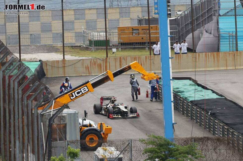 Foto zur News: Kimi Räikkönen (Lotus) kam im dritten Training am Samstagmorgen nicht weit - Motorschaden