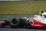 Foto zur News: Lewis Hamilton (McLaren) nach der  Nico Hülkenberg (Force India)