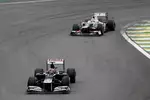 Foto zur News: Bruno Senna (Williams) und Sergio Perez (Sauber)