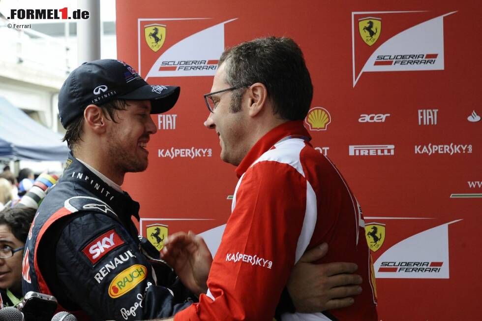 Foto zur News: Sebastian Vettel und Stefano Domenicali