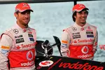 Foto zur News: Jenson Button (McLaren) und Sergio Perez (McLaren)
