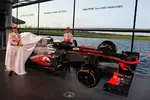 Foto zur News: Sergio Perez (McLaren) und Jenson Button (McLaren)