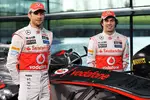 Foto zur News: Jenson Button (McLaren) und Sergio Perez (McLaren)