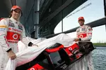 Foto zur News: Sergio Perez (McLaren) und Jenson Button (McLaren)
