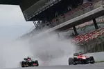 Foto zur News: Romain Grosjean (Lotus) und Max Chilton (Marussia)