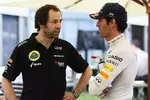 Foto zur News: Ciaron Pilbeam (Lotus) und Mark Webber (Red Bull)