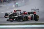 Foto zur News: Kimi Räikkönen (Lotus) und Romain Grosjean (Lotus)