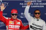 Foto zur News: Fernando Alonso (Ferrari) und Lewis Hamilton (Mercedes)