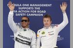 Foto zur News: Lewis Hamilton (Mercedes) und Kimi Räikkönen (Lotus)